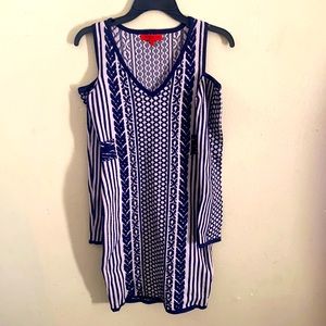 Tight fitted dress, shoulders out,a lot of stretch.